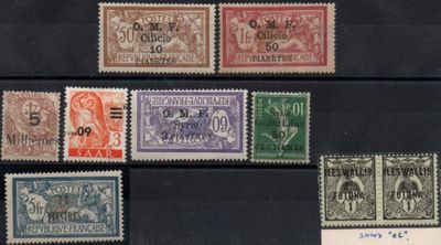 a close up of a group of stamps on a black surface