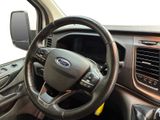 a steering wheel and dashboard of a vehicle