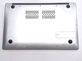 a close up of a silver laptop computer on a white surface