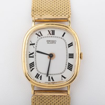 SEIKO Montre homme, boitier 24mm et bracelet or, mouvement q… - Photo 1