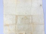 a piece of paper with writing on it sitting on top of a table