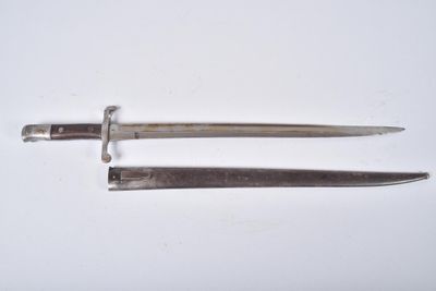 pair of silver plated knives on white surface with white background