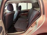 a car that has two seats in the back of it