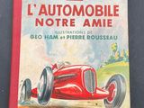 un vieux livre pour enfants sur lequel figure l'image d'une voiture de course