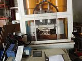 a machine that is sitting on a table in a garage