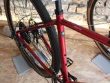 a red bike that is sitting on the ground