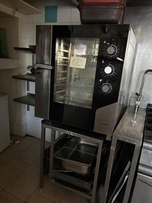 an image of a kitchen with a stove and oven