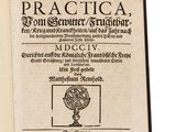 an old book with a picture of a globe on top of it
