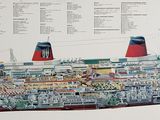 diagram of a large cruise ship on display in a museum
