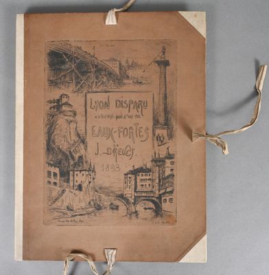 an old book with a picture of a town on it