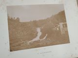 a picture of a picture of a waterfall in the woods