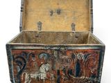 an old wooden box with a painting on the inside of it