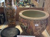 two vases that are on display in a store