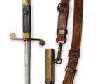 a knife and a knife holder on a white background