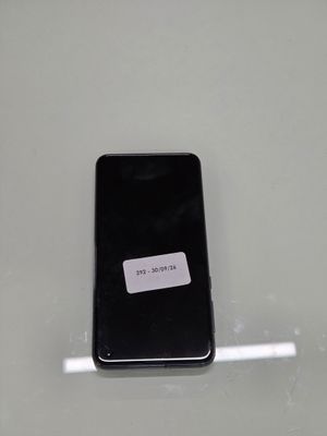 a cell phone that has a sticker on it