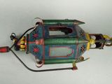 a toy train that is sitting on a white surface