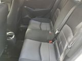 the back seats of a car are empty with no one in it
