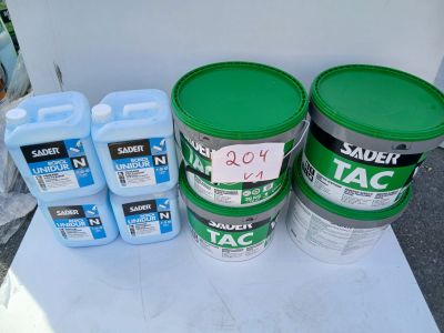 three buckets of paint sitting on a table next to two cans of paint