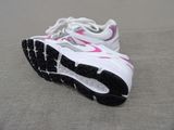 a close up of a pair of shoes on the ground