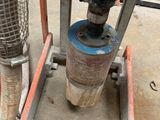 a picture of a machine that is sitting on a stand