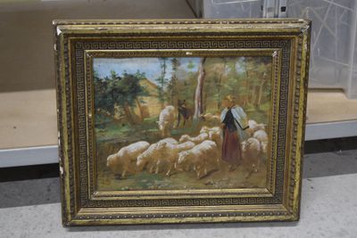 une photo d'un tableau représentant un homme avec un troupeau de moutons