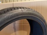 a close up of a tire on a cardboard box