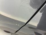 a car that has a crack in the side of it