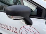 an image of a car with a mirror on the side of it