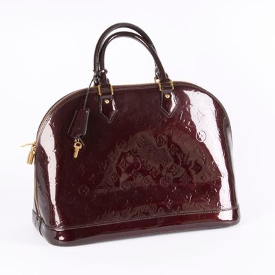 a close up of a handbag on a white background