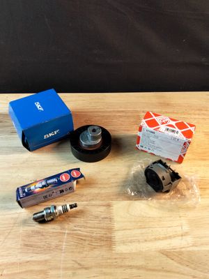 Lot de 3 articles (kit pour galet enrouleur multi-v, bougie …