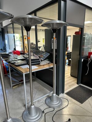 three lamps that are sitting on the floor in the room