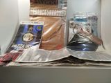 a lot of items that are sitting on a shelf