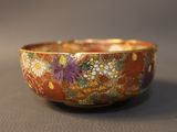 a close up of a colorful bowl on a table