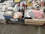 a pile of electronic equipment sitting on a pallet