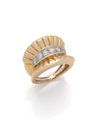 an 18k gold and diamond ring