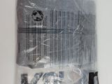 a bag of clothing that is sitting on a table