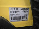 the back end of a yellow motorcycle with a barcode on it