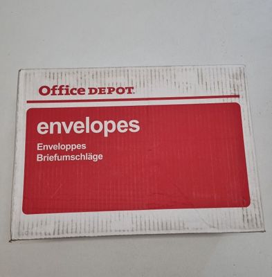 a red and white sign that says envelopes on it