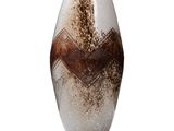 a vase that has a brown and white design on it