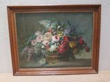 une peinture de fleurs dans un panier sur une table