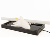 an image of a cigarette holder with a cigarette in it