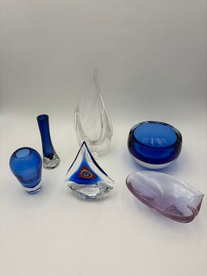 a lot of glass items that are on a table