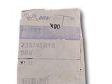 a picture of a box of mail with a sticker on it