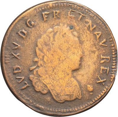 a close up of a coin with a woman ' s face on it