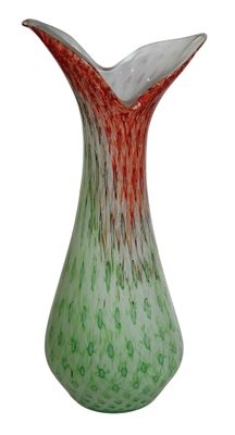 a green and red vase sitting on a white surface
