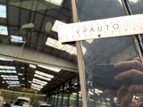 a man taking a picture of himself in the mirror