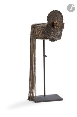 a close up of a sculpture of a hat on a stand