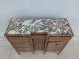 two drawers with marble top on each side of them