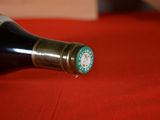 a bottle of wine that is sitting on a table