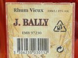 a label that says j bally on a bottle of liquor